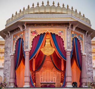 a-photo-of-a-rajasthani-wedding-decor-with-a-jai-m-F5yPgzCeSSOprTXZITcZhw-71EY85jaSf2LF0XVq8aNpQ